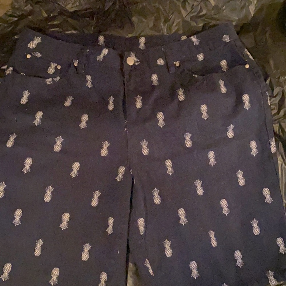Brand new shorts size 14 front and back pockets a type of Jean material